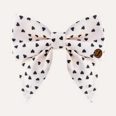 Cream sailor bow tie with ditsy black heart pattern