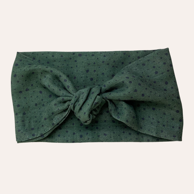 Dark green knotted scarf with black spot pattern