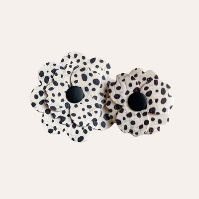 White and black Dalmatian spotted cork flowers in two sizes