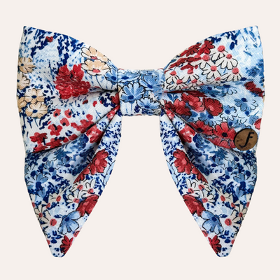 Floral sailor bow in blue, red, white, and gold colored pattern