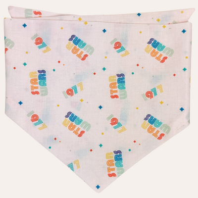 Dog bandana with Star Wars and 1977 written in retro rainbow font and small star pattern motif in background