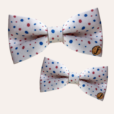 White bows with red and blue spot pattern