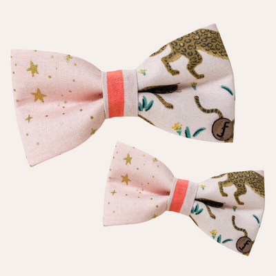 Pink bow ties with metallic stars and leopards