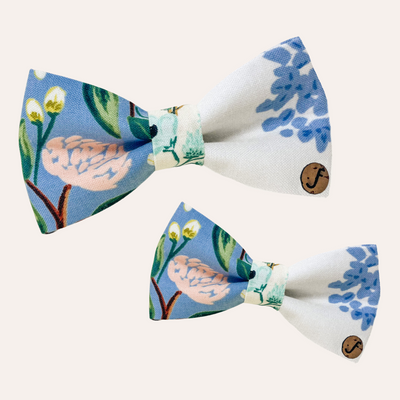 Bow ties made with blue and white floral fabric from Rifle Paper Co.