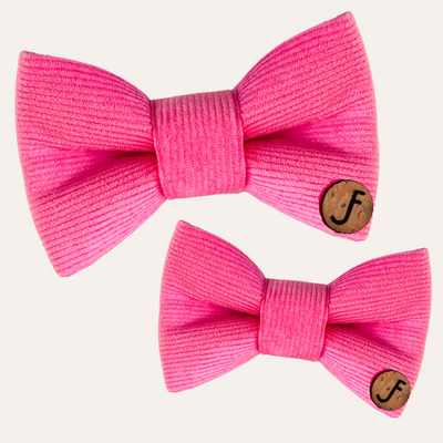 Bright pink corduroy bows