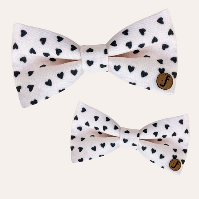 Cream bow ties with ditsy black heart pattern