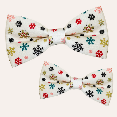 Cream bow ties with multi color snowflake print including metallic gold