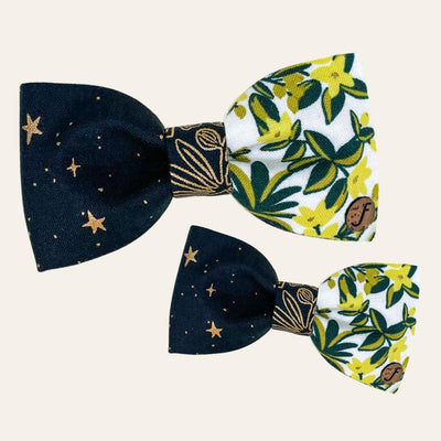 Black and white bow ties with metallic gold stars and yellow floral print