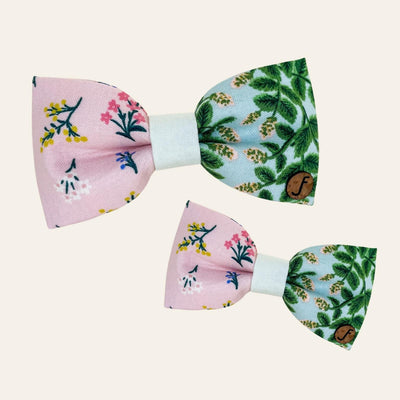Pink and baby blue bow ties with floral motifs