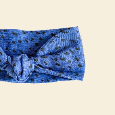 Blue knotted scarf with black leopard print