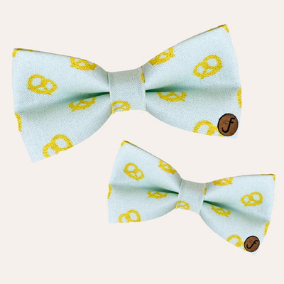 Light blue green bow ties with yellow pretzel print